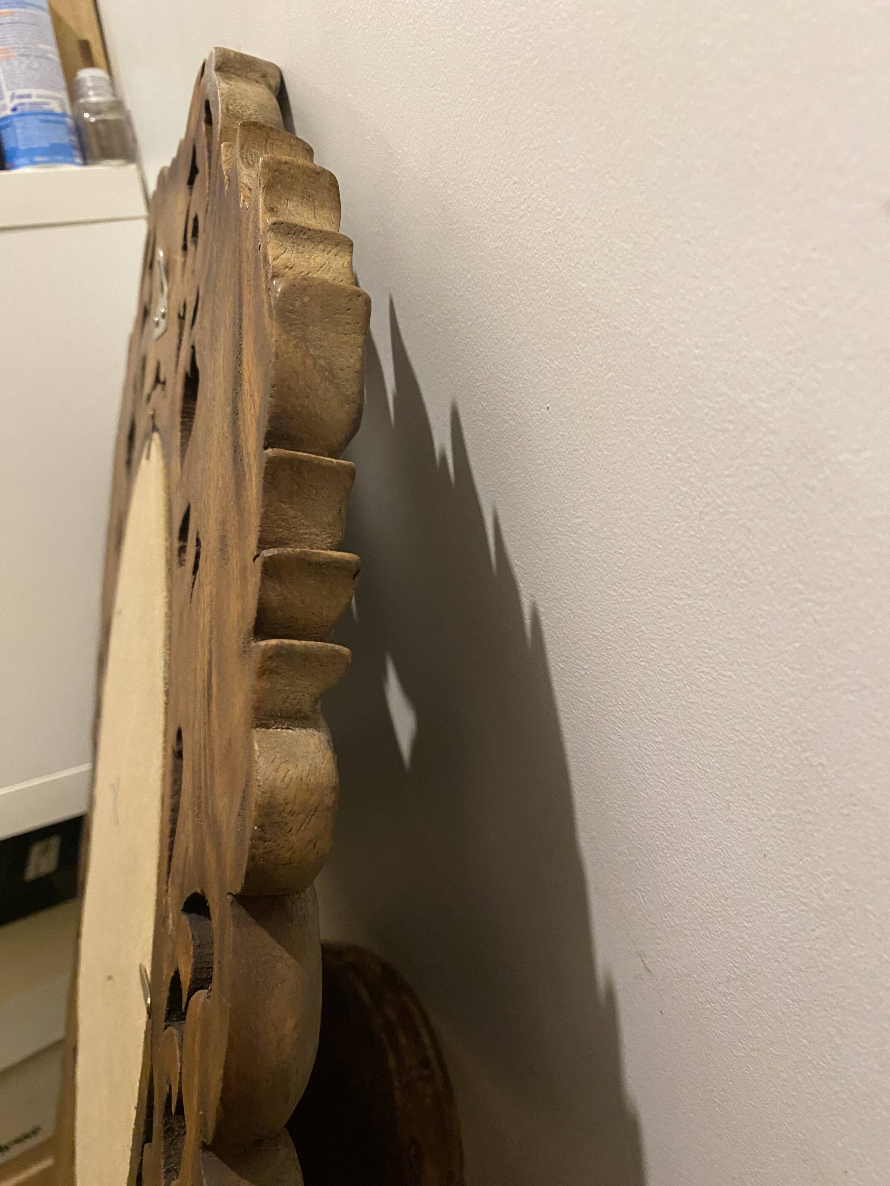 Carved mirror with integrated shelf
