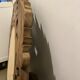 Carved mirror with integrated shelf