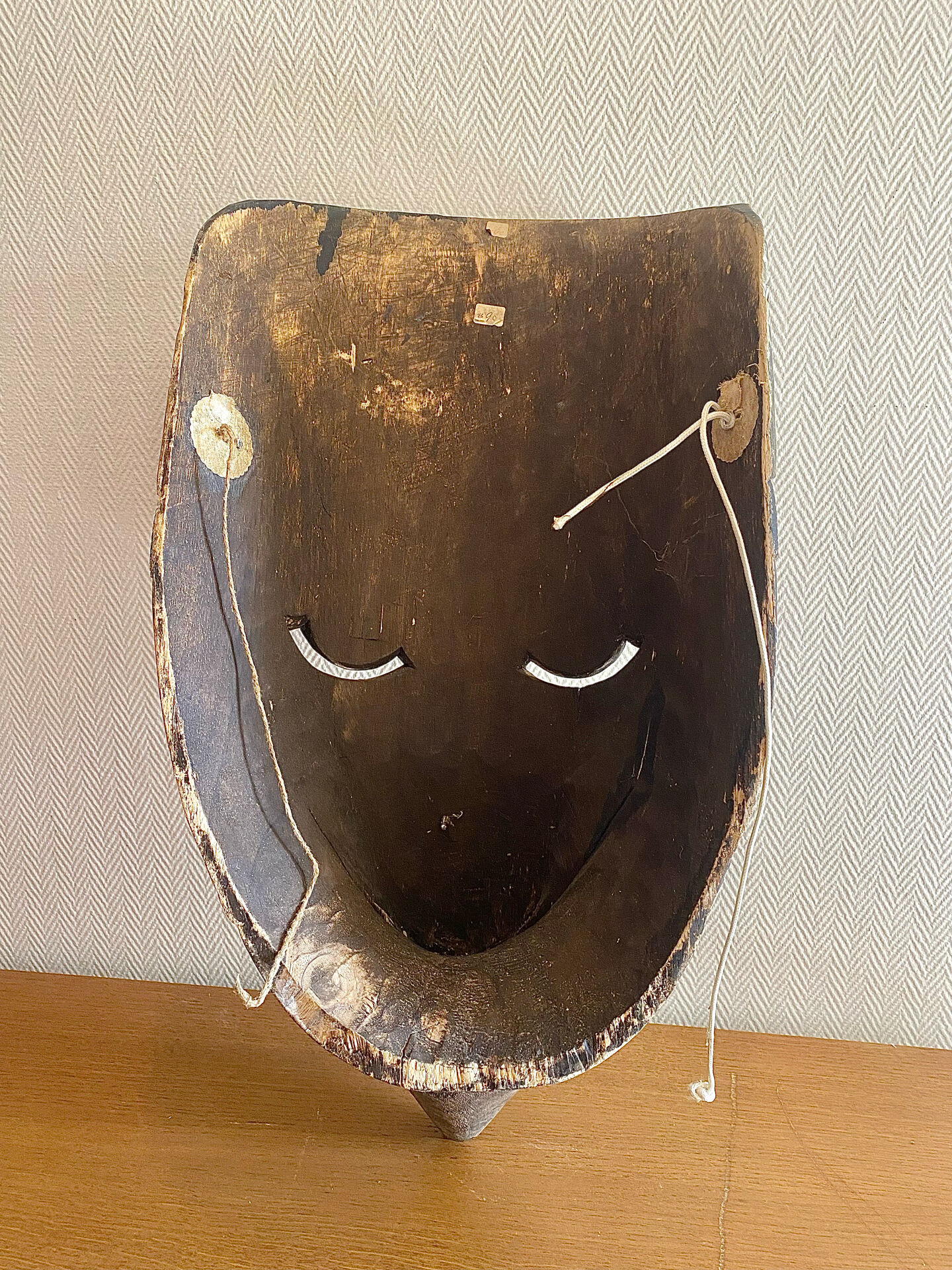Grand traditional Indonesian mask carved from wood.