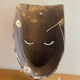 Grand traditional Indonesian mask carved from wood.