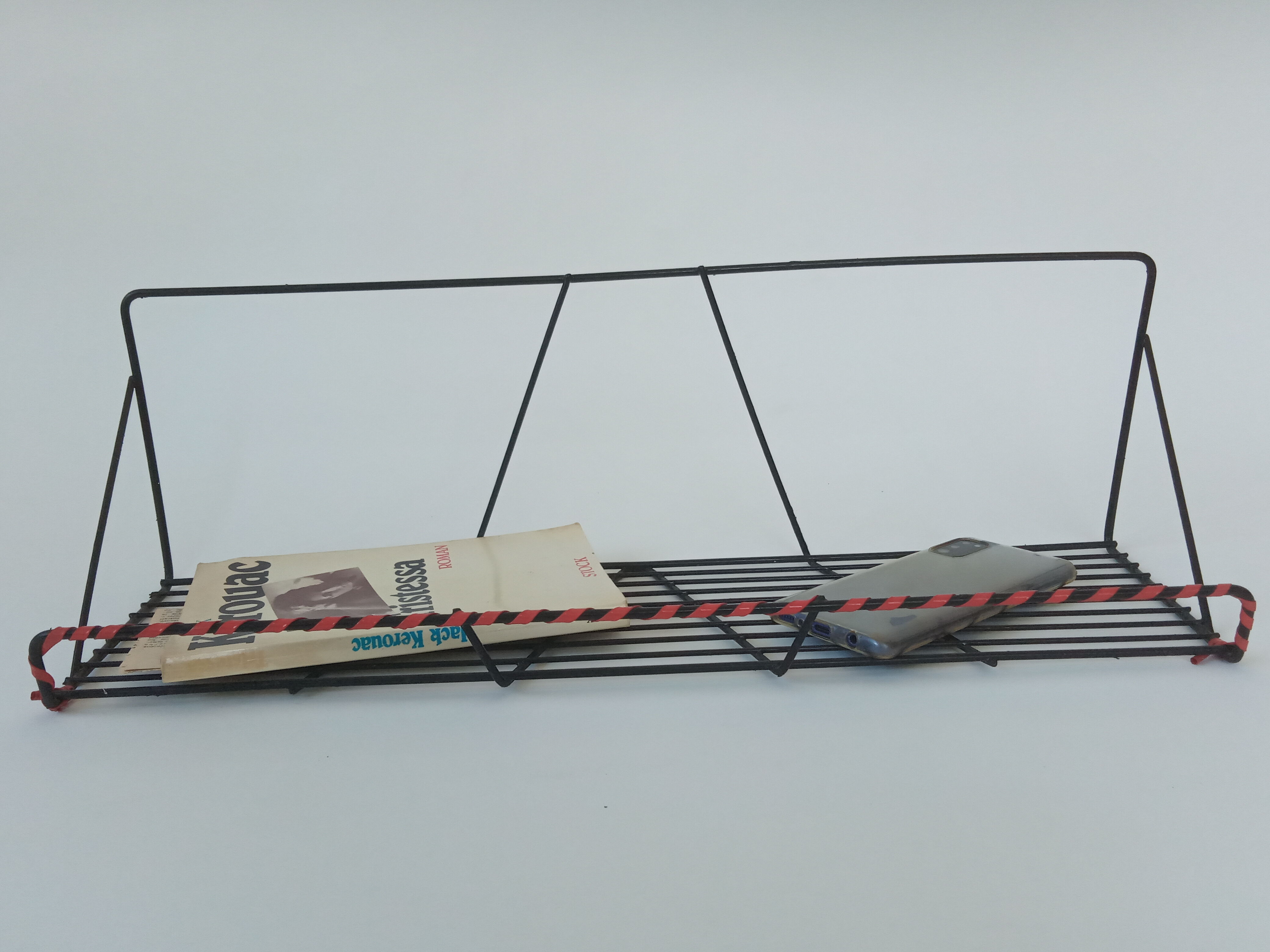 Vintage wall shelf made of metal wire