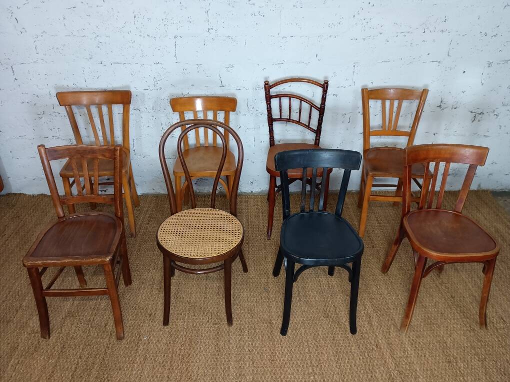 Set of 8 mismatched vintage bistro chairs