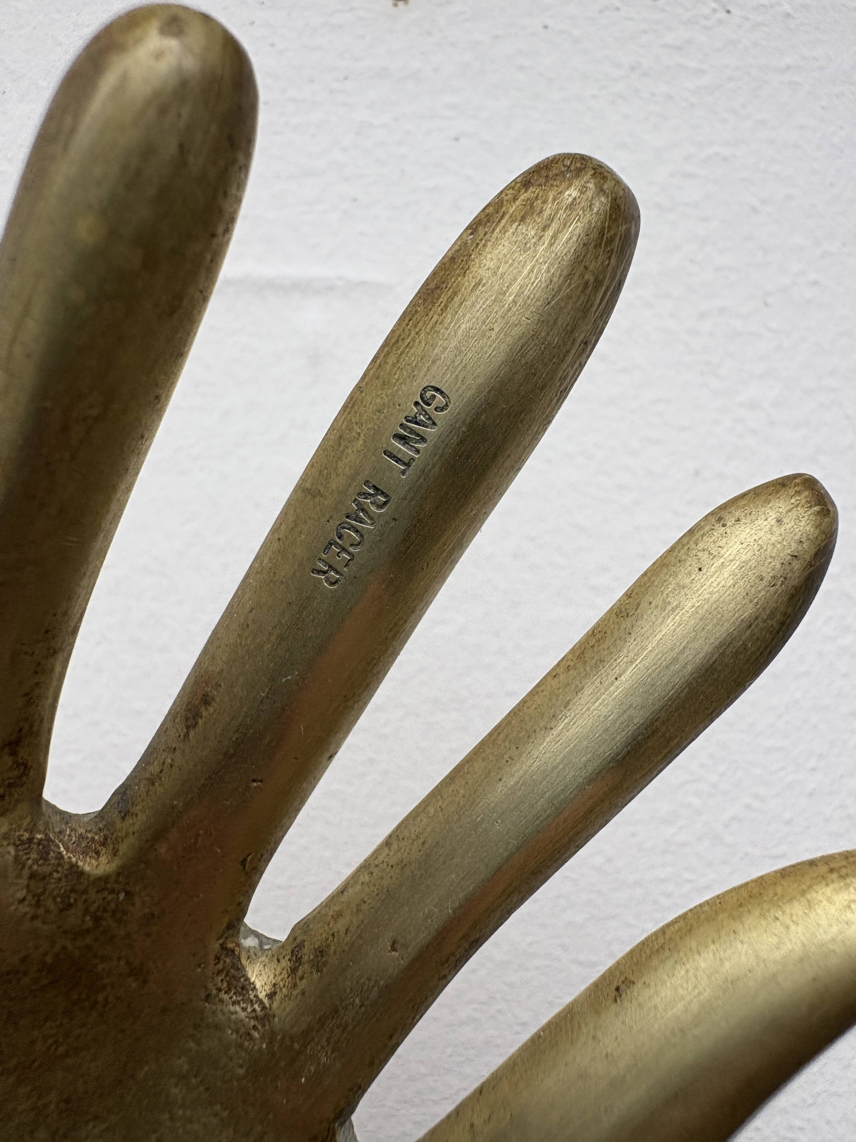 Vintage brass hand ashtray/trinket tray