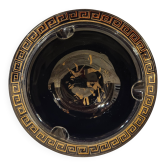 Small vintage ashtray in black ceramic with gold decoration in Greek style.
