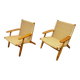 Pair of Scandinavian armchairs in woven solid teak.