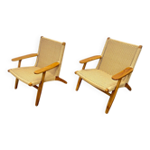 Pair of Scandinavian armchairs in woven solid teak.