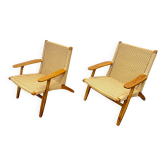 Pair of Scandinavian armchairs in woven solid teak.