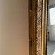 Gilded mirror with frieze h2m10 l:73cm