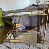 Vintage style serving trolley in gold metal