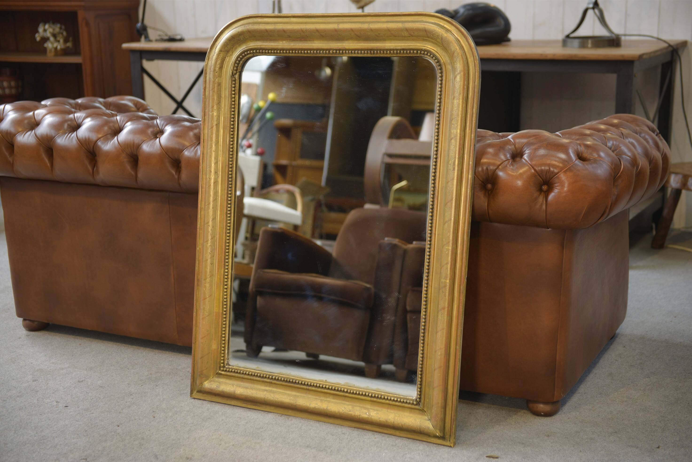 Mercury mirror from the Louis Philippe period, gilded with gold leaf, 19th century.