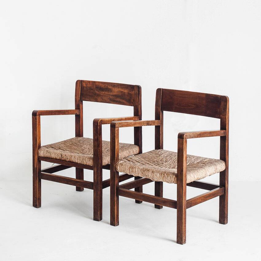 Pair of rustic armchairs in solid wood and straw seats. France, 1940s