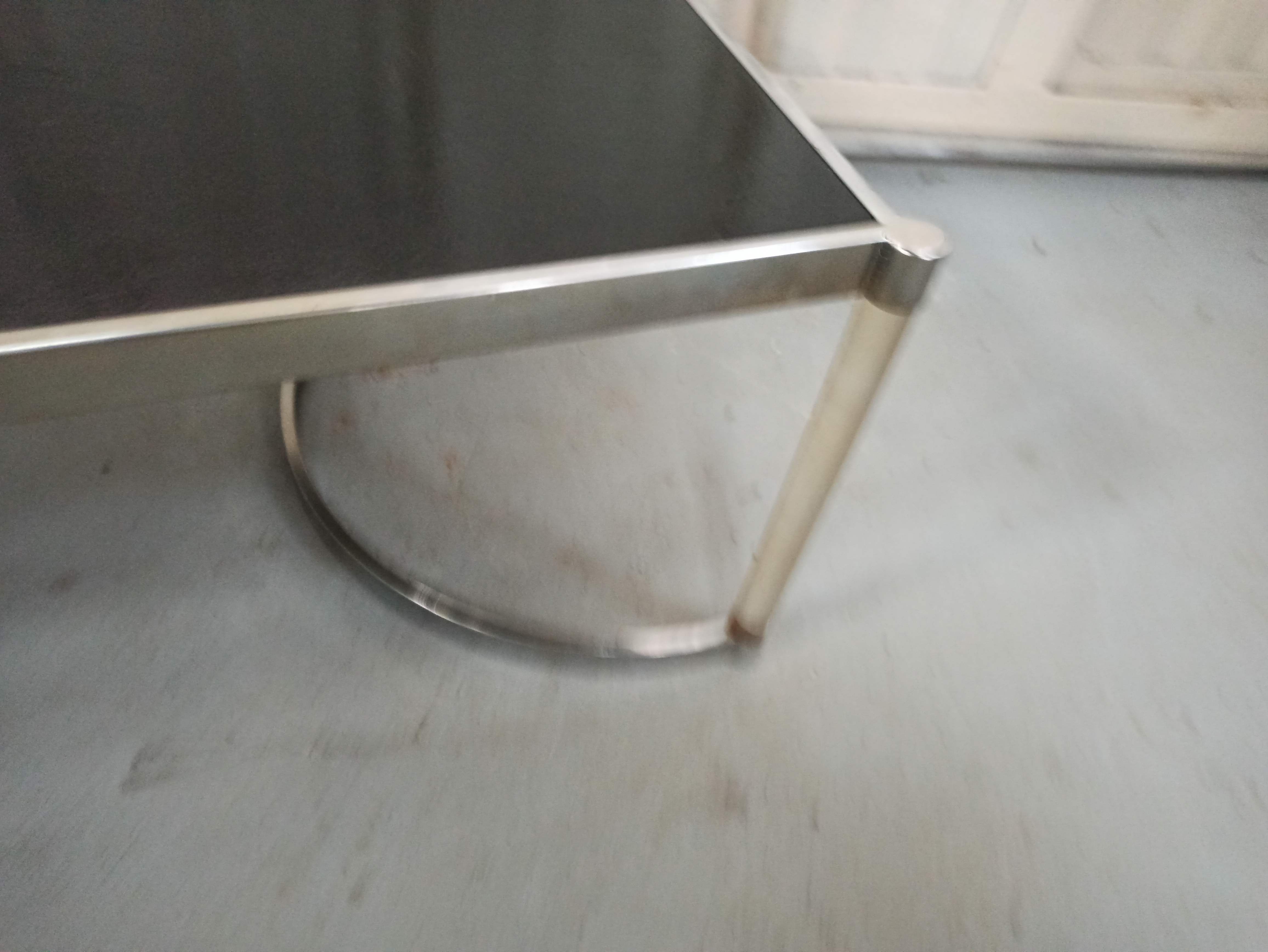Plexiglas and iron coffee table
