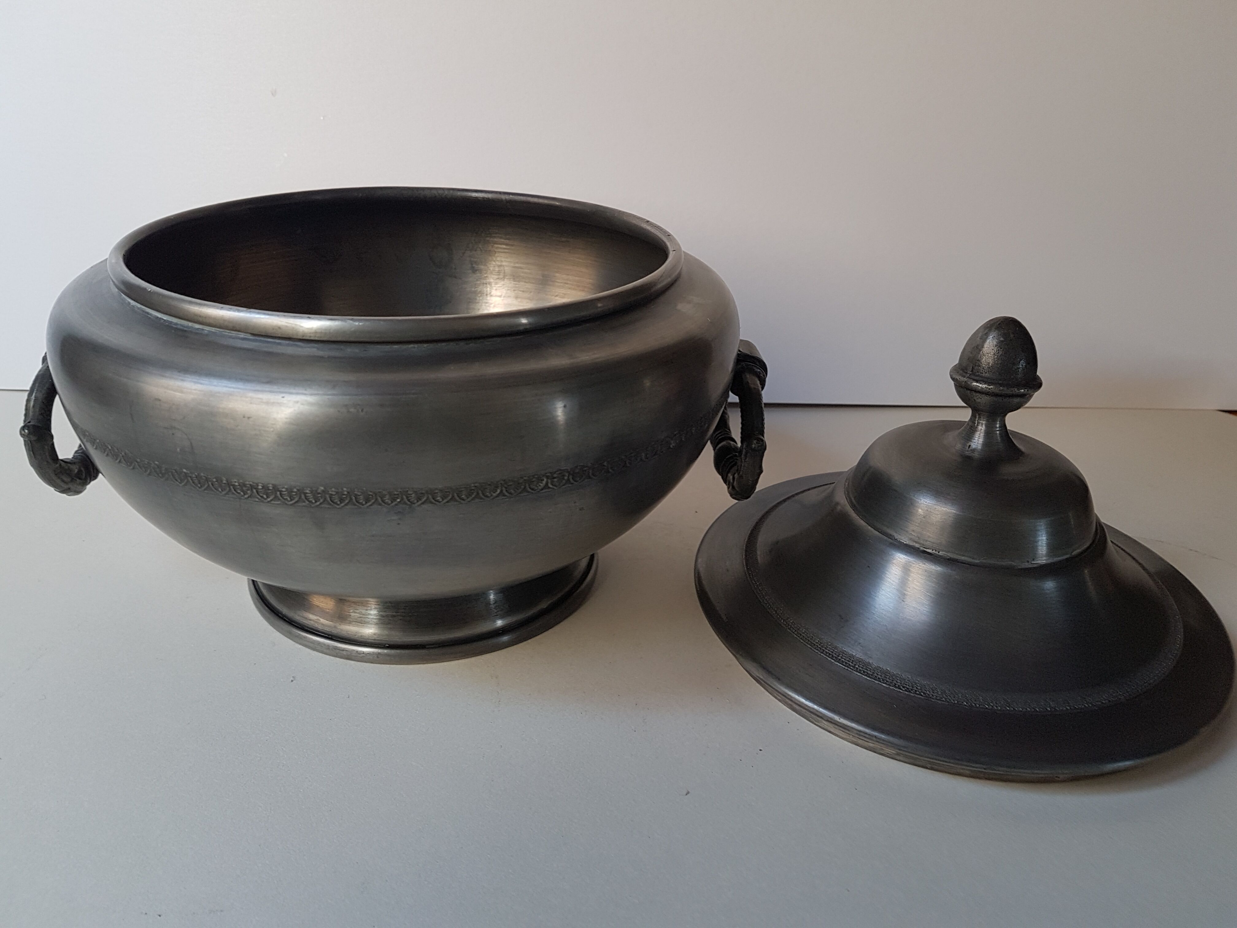 Soup tureen on a pewter serving dish