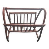 Dark rattan magazine rack