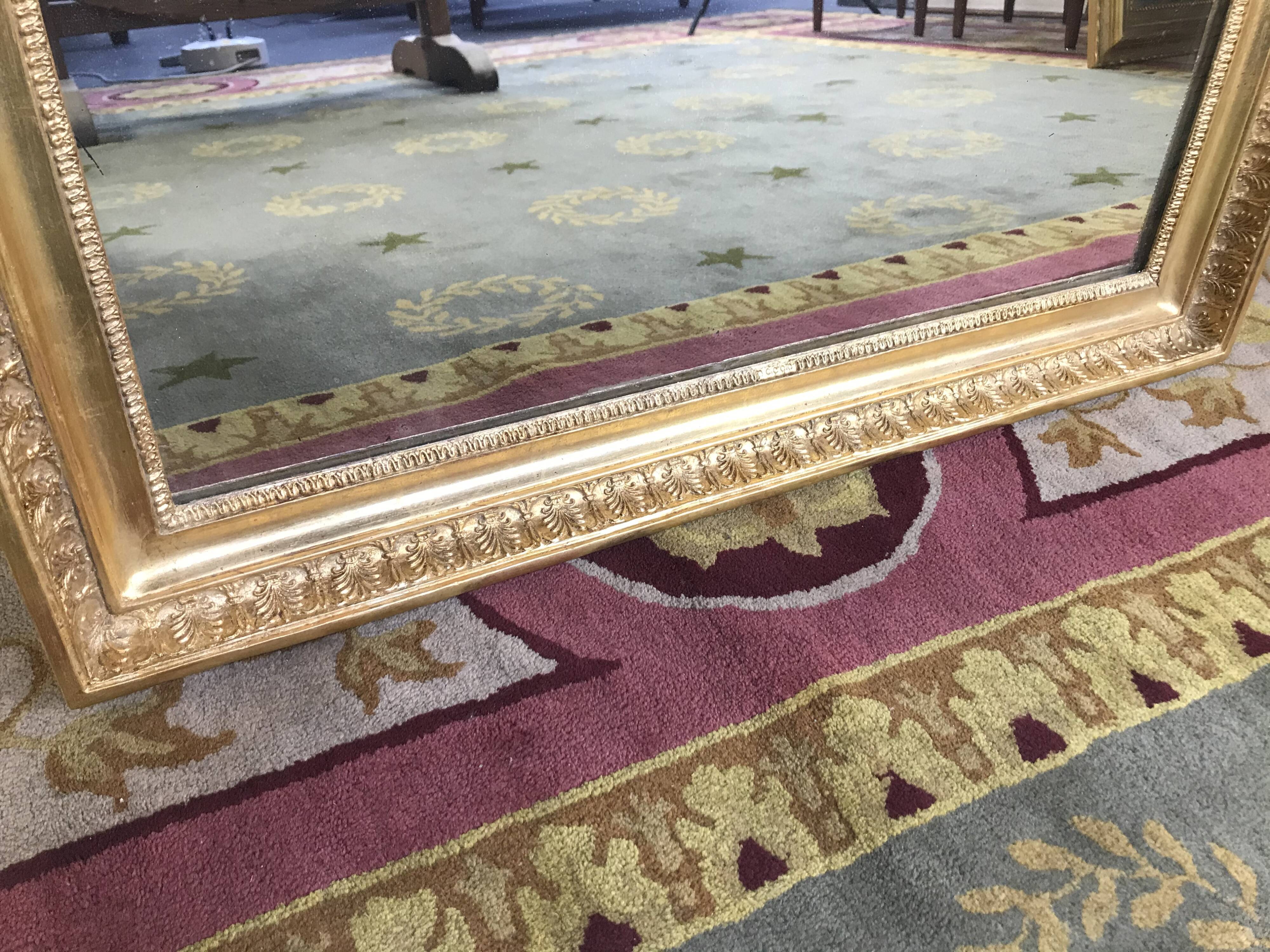 Empire mirror with palmettes gold leaf restored