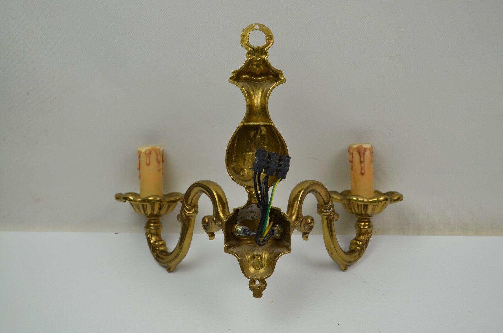 Pair of wall lamps with two lights in Louis XV style bronze