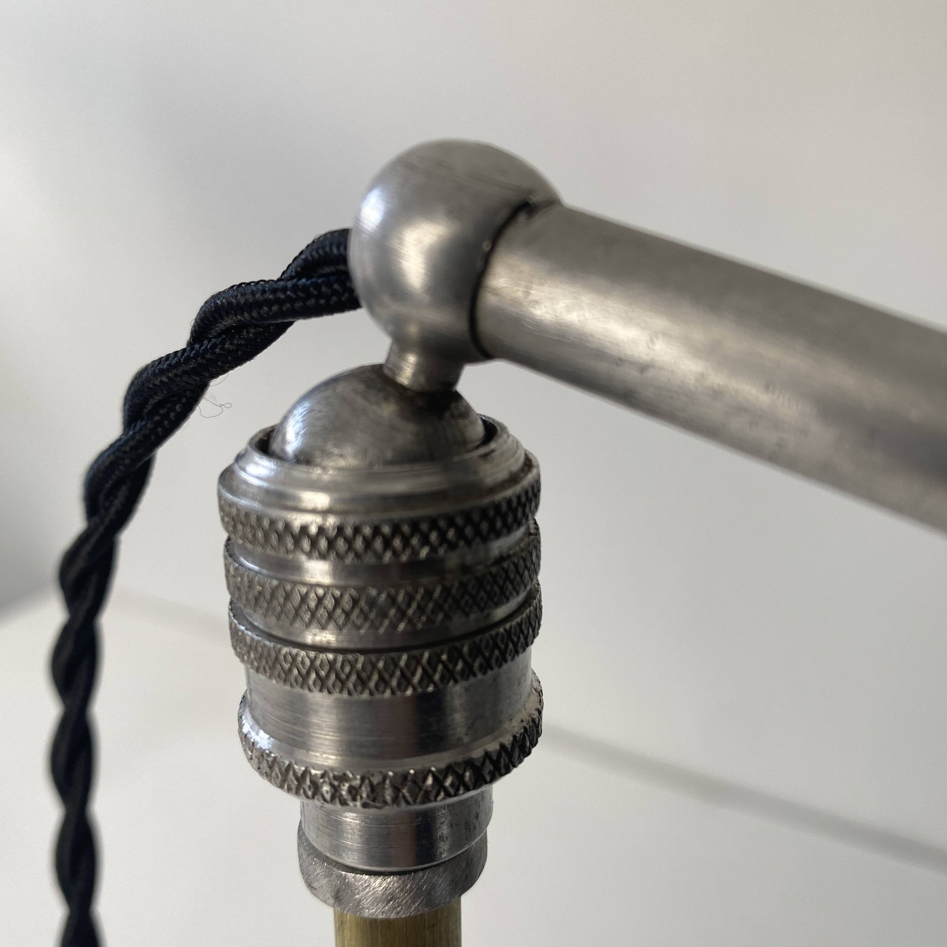 Old articulated industrial workshop lamp