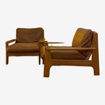 Paire de fauteuils danois des années 70 en cuir et chêne massif