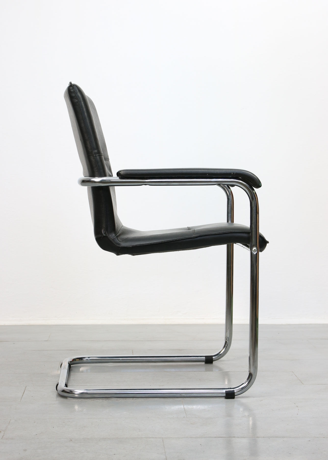 Vintage black leatherette office cantilever chair, 1970s