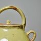 Small vintage pale yellow enamelled terracotta goat jug