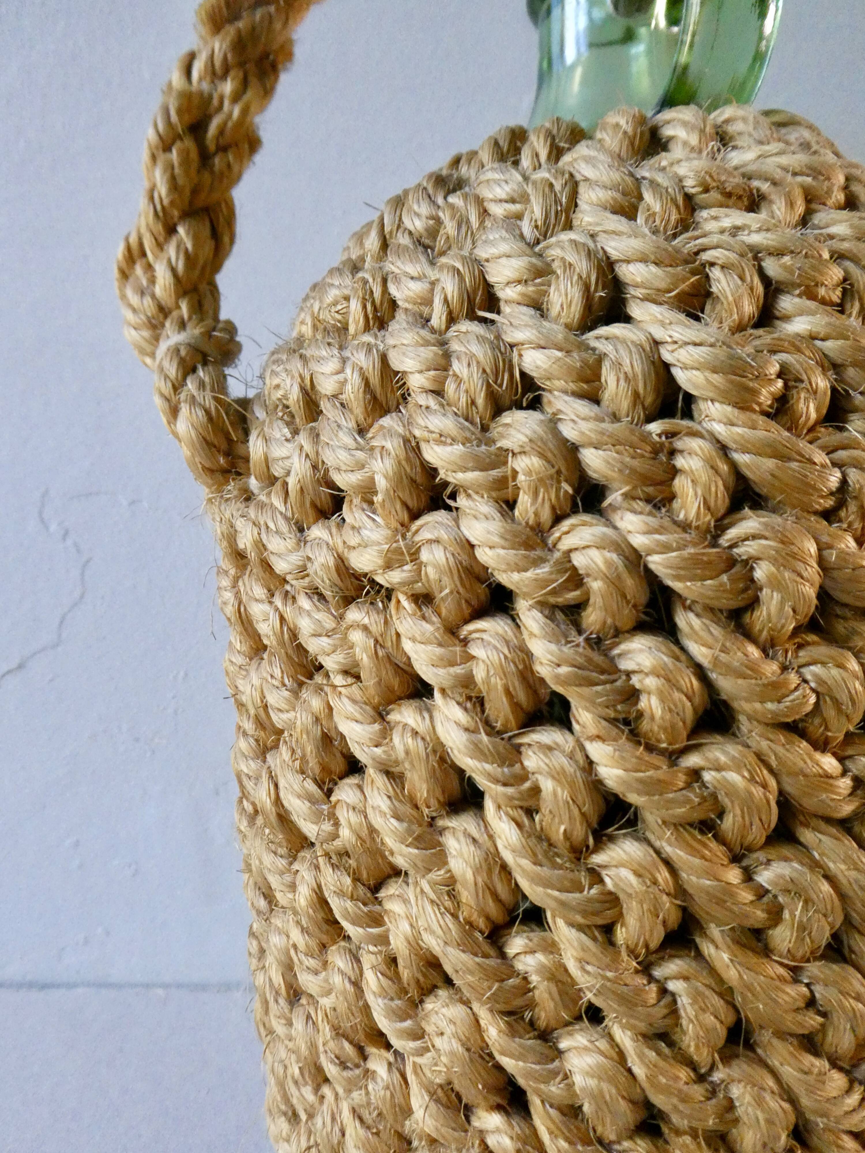 Glass bottle with braided rope, 60s