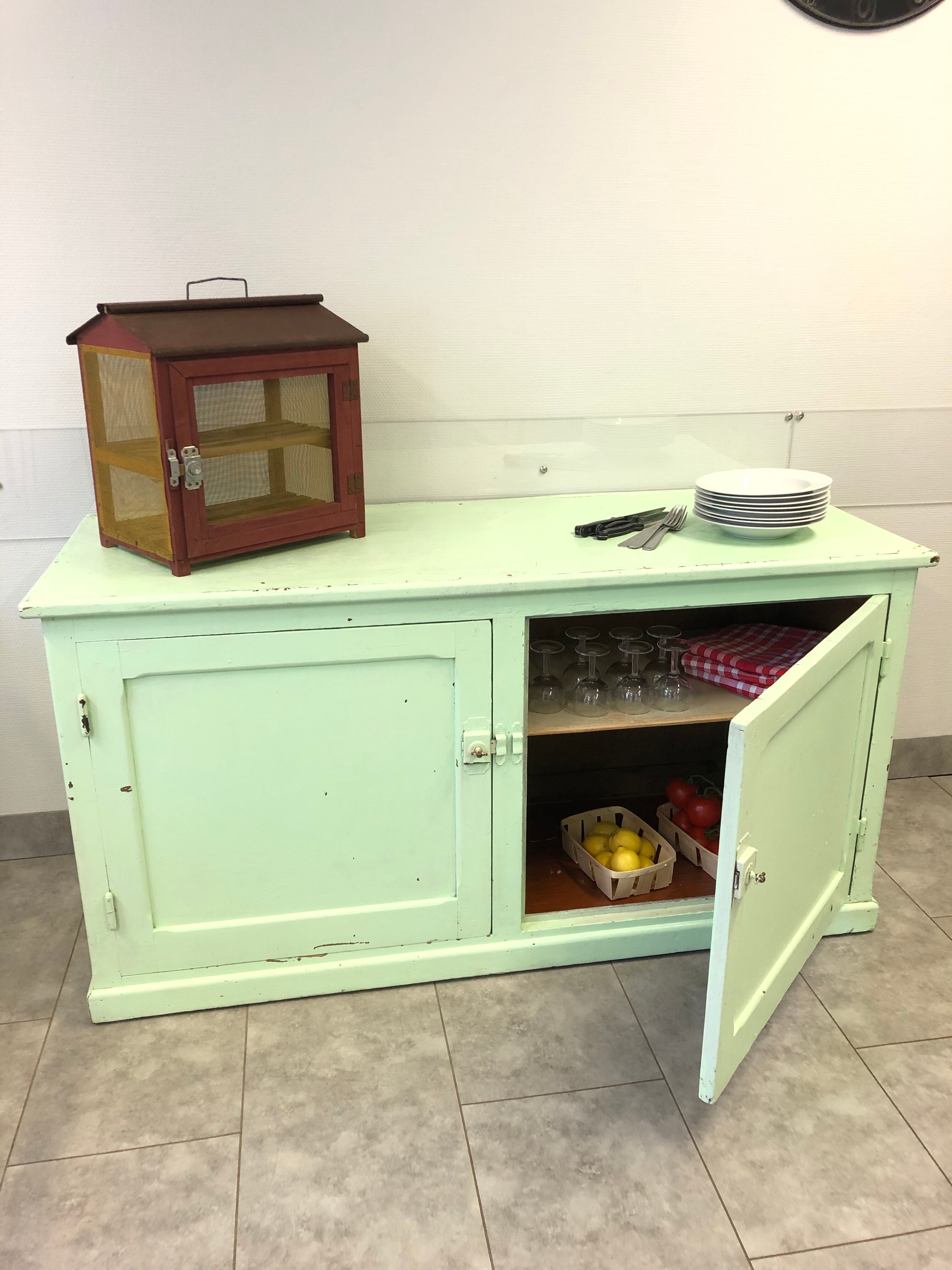 Low green patinated furniture