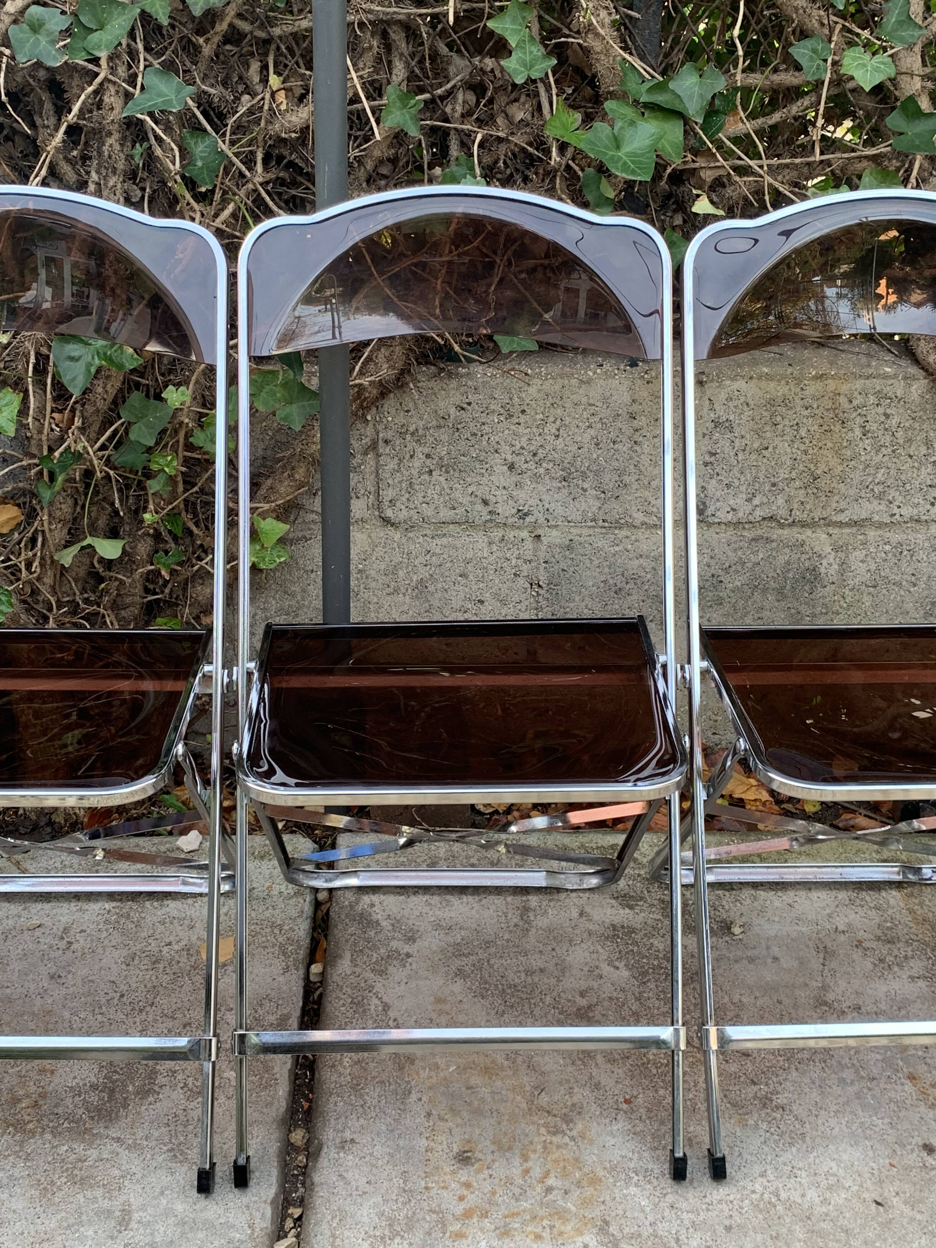 6 chaises pliantes en Plexiglas fumé et métal chrome Chaisor 1970