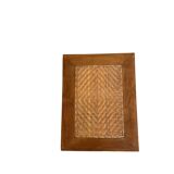 Vintage wooden and wicker side table