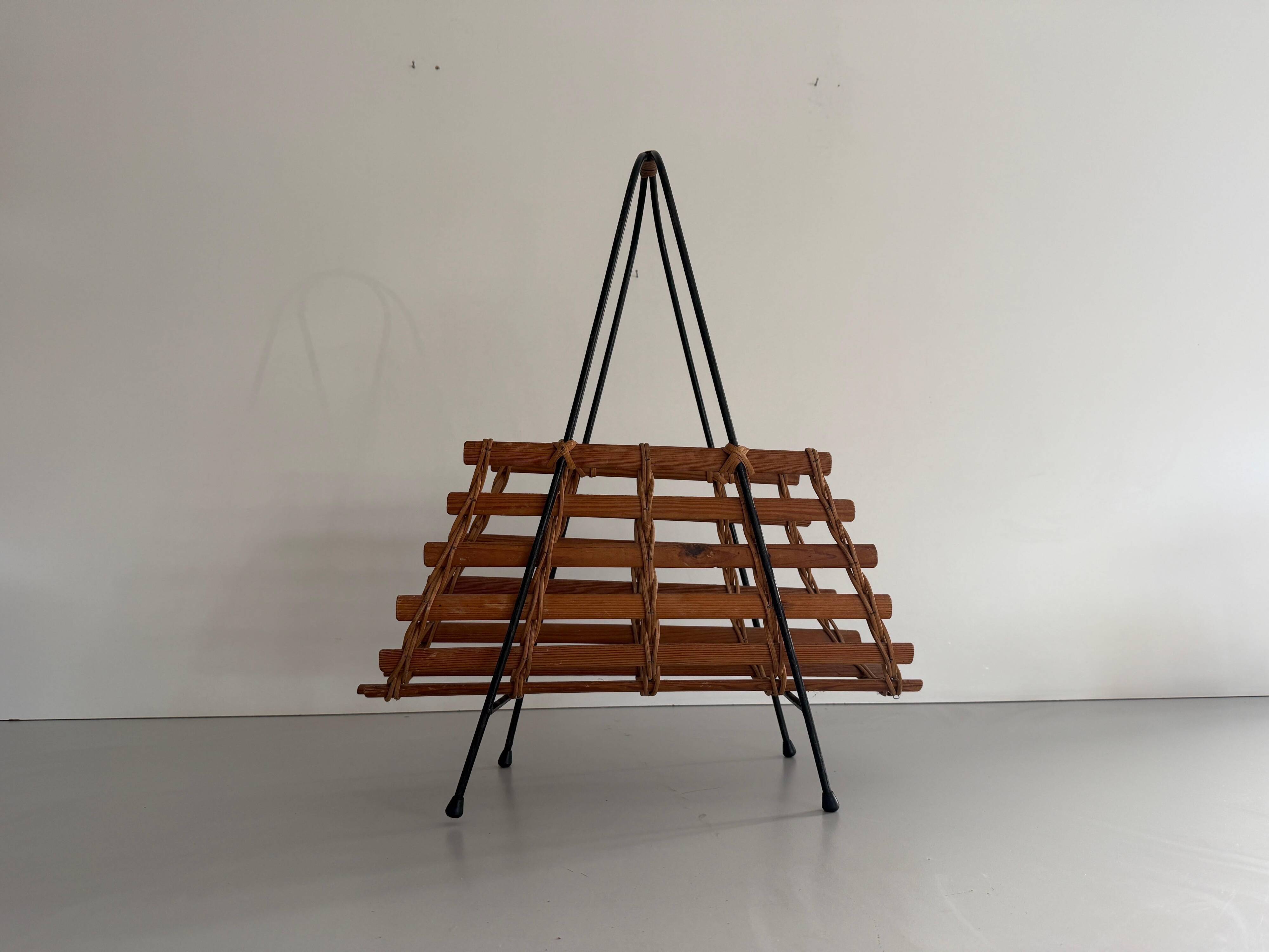 Mid-century black metal and wicker magazine rack, 1960, Germany