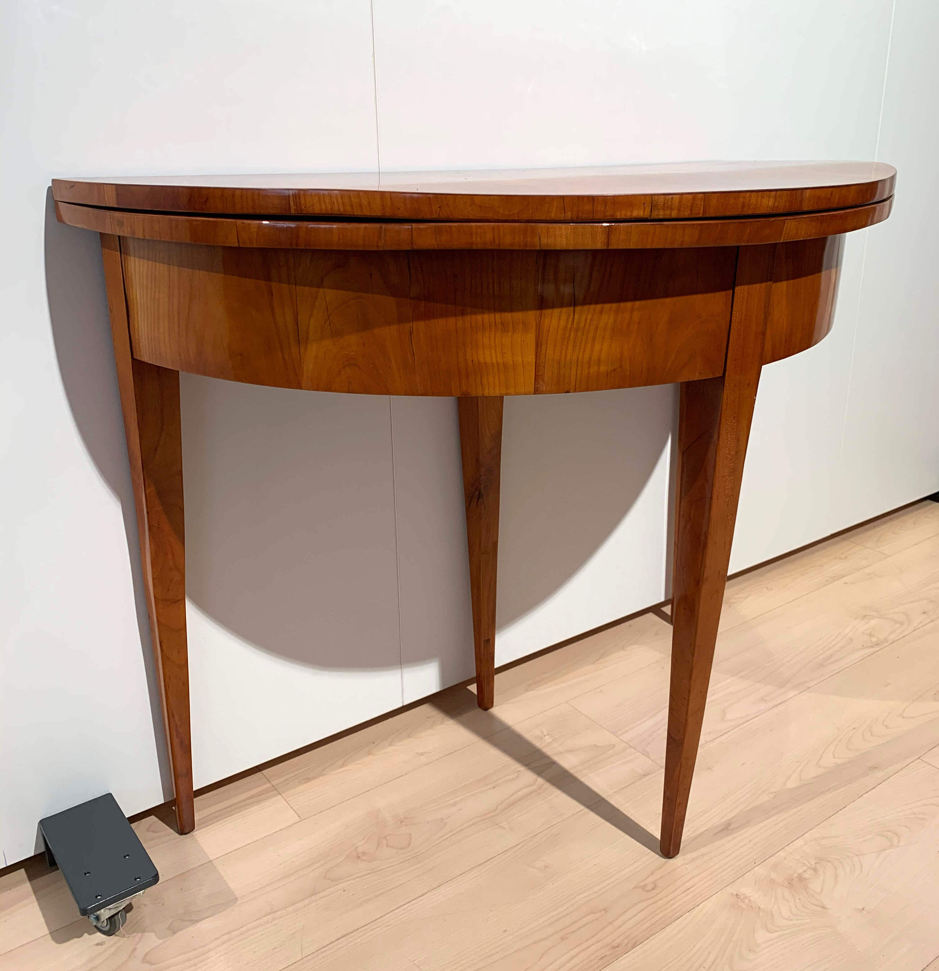 Biedermeier demi-lune fold-out table, cherry veneer, south germany, circa 1820