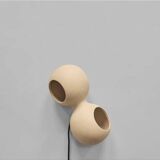 Table lamp or wall lamp in sand color made of ceramic, contemporary work.