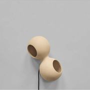 Table lamp or wall lamp in sand color made of ceramic, contemporary work.