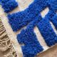 Wool rug with geometric patterns 200/300