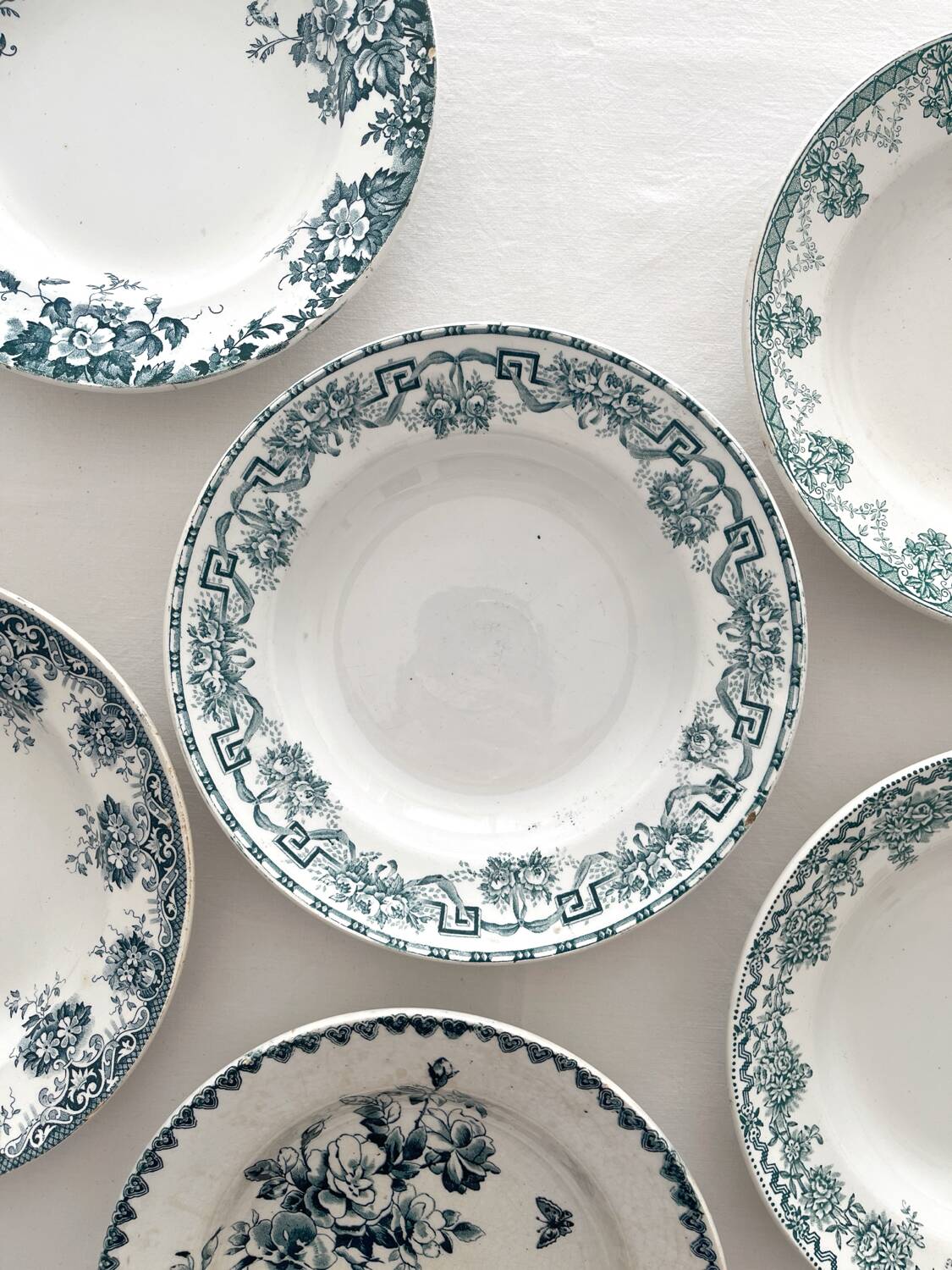 6 mismatched ironstone soup plates from Saint Amand