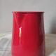 Enamelled metal pourer