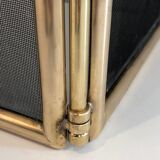 Brass and wire mesh firewall. french work. around 1970