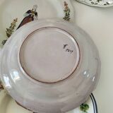 4 hand-painted earthenware plates in a holiday home style