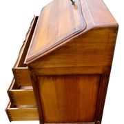 Secretary desk called "scriban" in Louis XV style made of fruitwood.