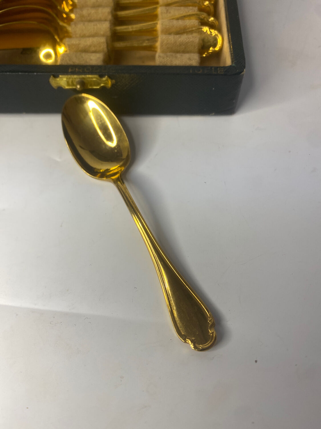 12 small silver-gilt spoons