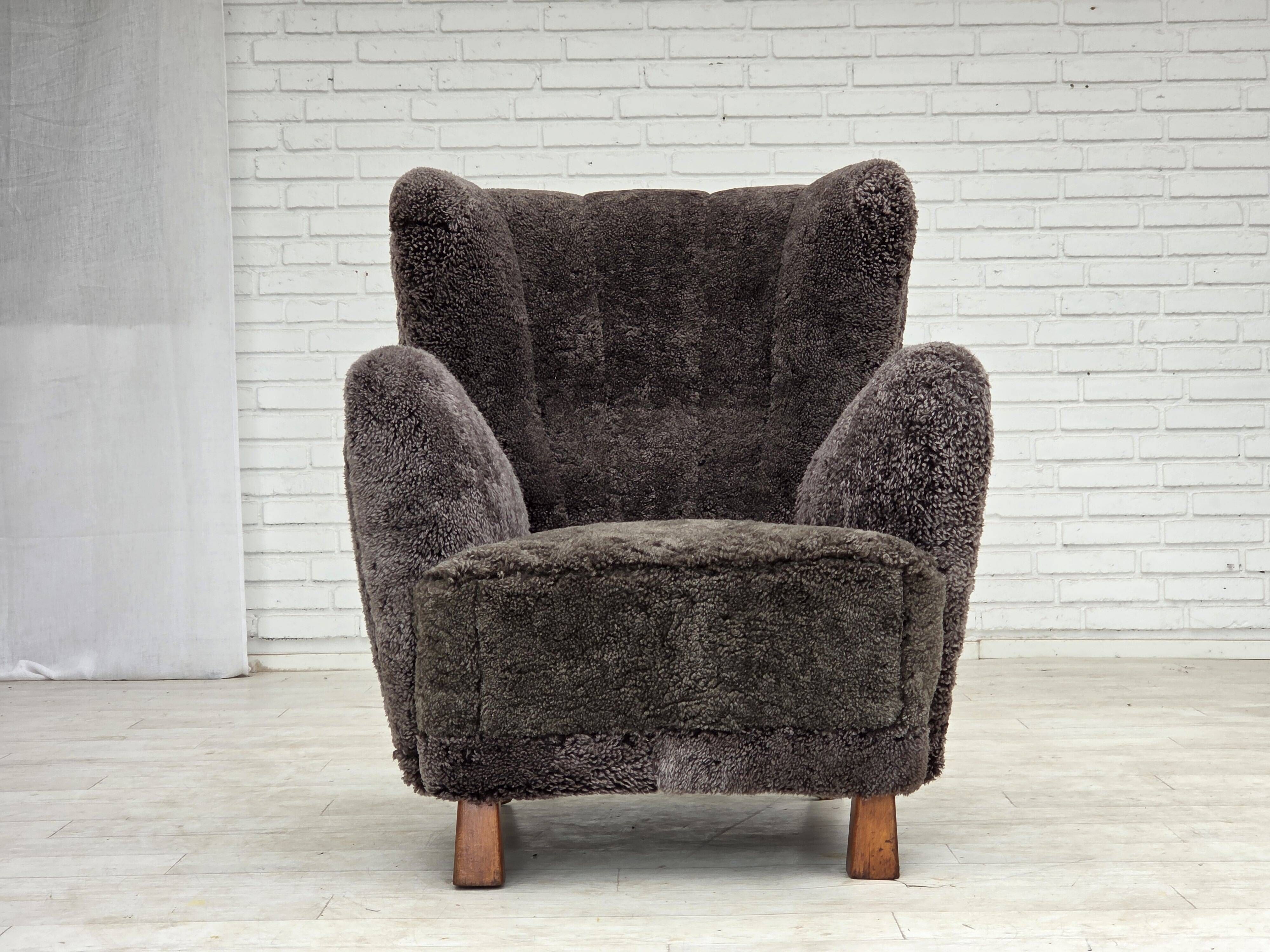 1960s, Danish design, reupholstered armchair, genuine sheepskin.