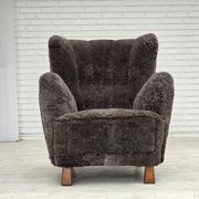 Années 1960, design danois, fauteuil rembourré, véritable peau de mouton.