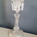 Old candlestick with molded glass stamps