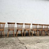 Set of 8 vintage bistro chairs – Warm stained wood – Compass legs