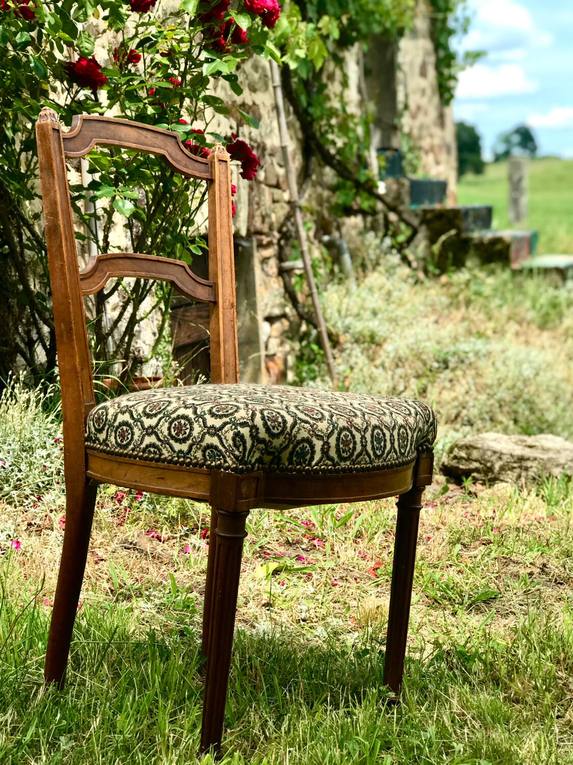 Antique chair seat upholsterer medallions