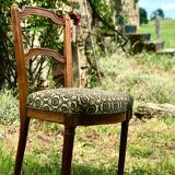 Antique chair seat upholsterer medallions