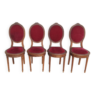 Suite de 4 chaises médaillons Louis XVI en noyer