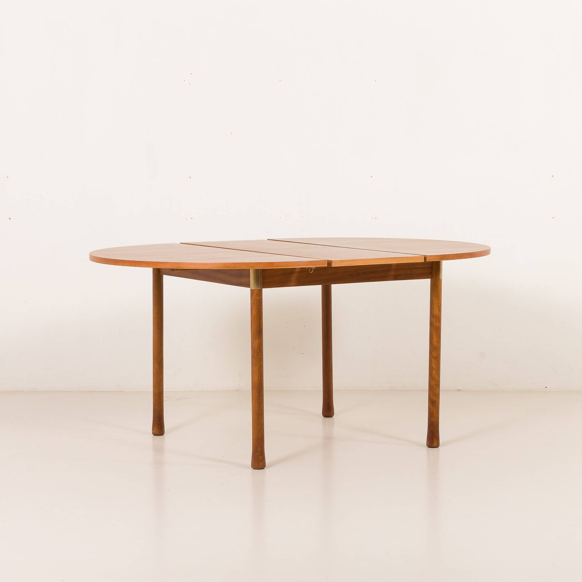 Italian mid-century round extension teak table with brass details, 1960s