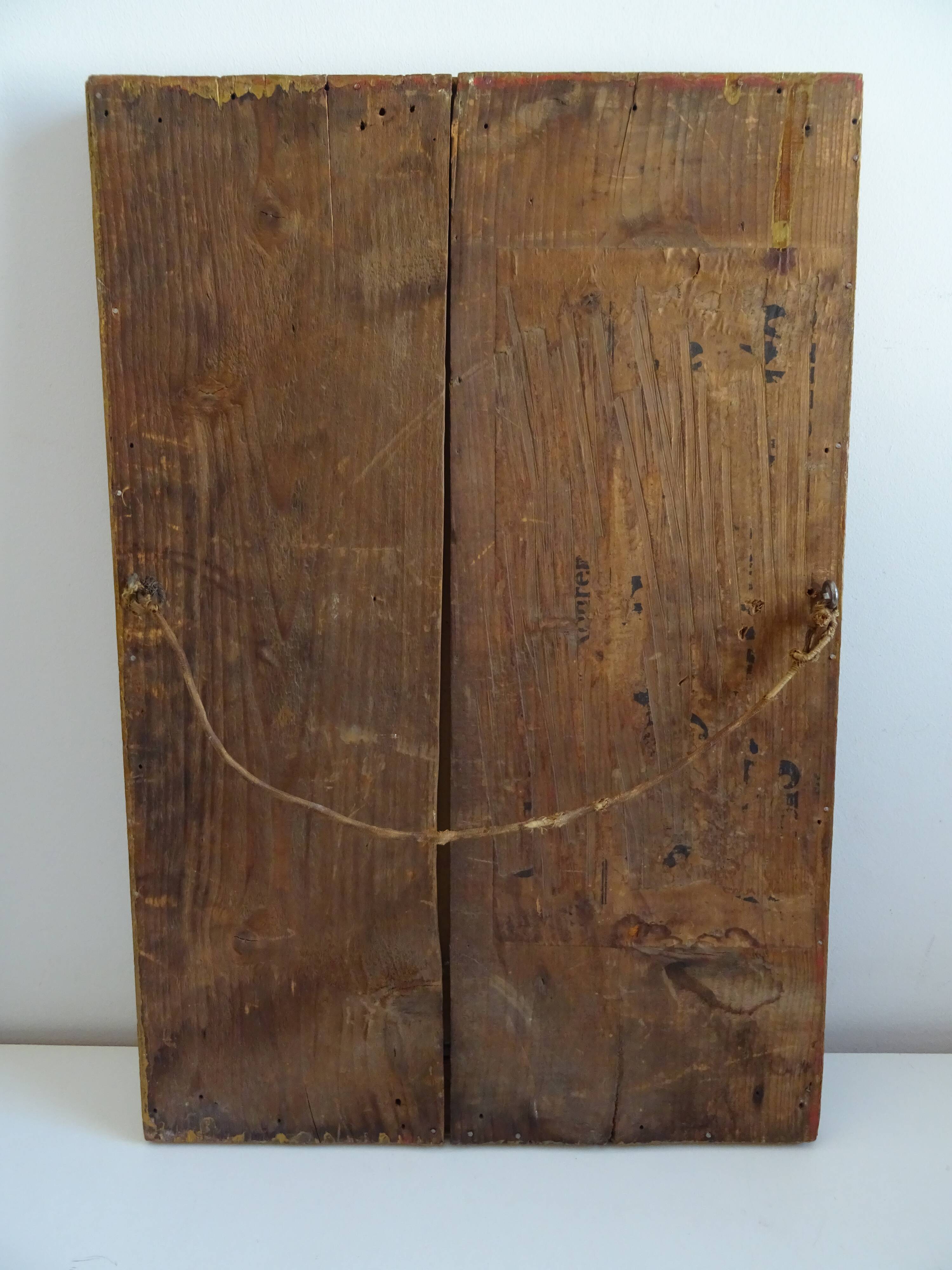 Wood and gilded stucco wall mirror