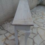 Console with a weathered grey cotton base, top in bleached walnut.