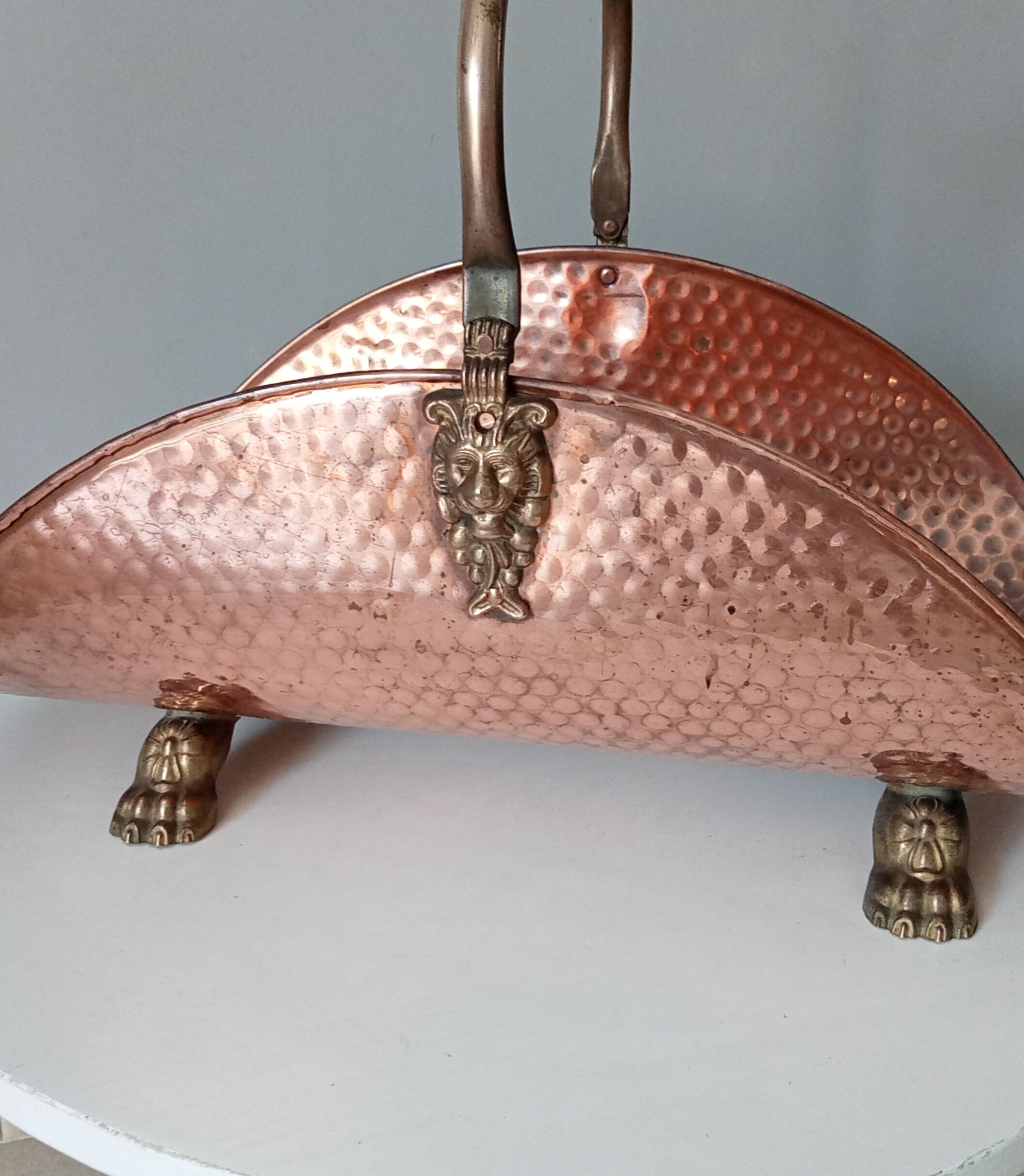 Old log holder in copper and brass